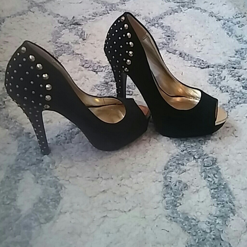 Black and gold studded high heels